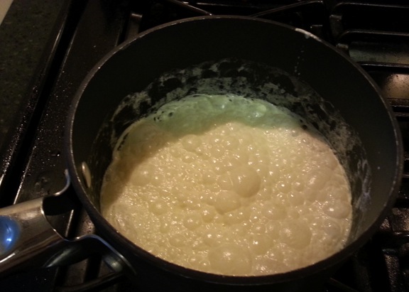 Boiling the cream.