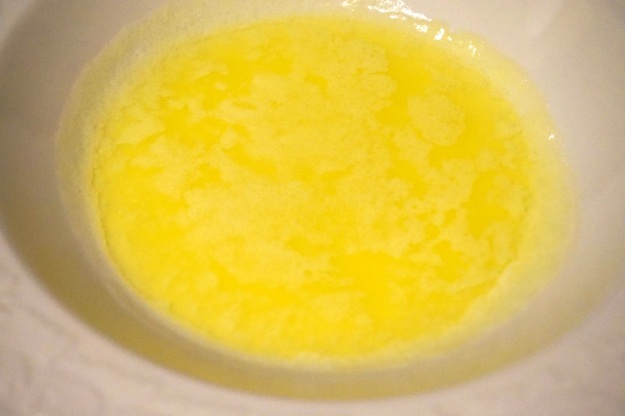 Butter, the first part of the topping.