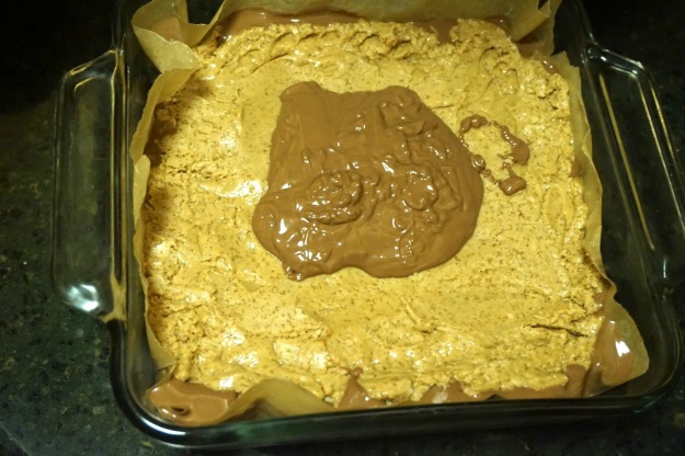 Peanut butter layer with the start of the top chocolate layer